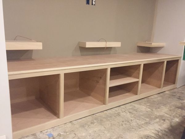 A TV stand built into a cubby